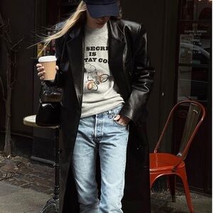 Vintage long black leather trench coat lined thinsulate snap closure size Medium